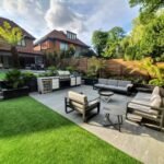 Outdoor kitchen porcelain seating area, fencing, artificial grass garden design mill hill