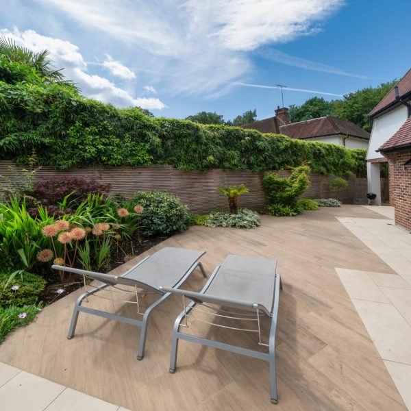 Morden garden design with patio flower beds and fencing